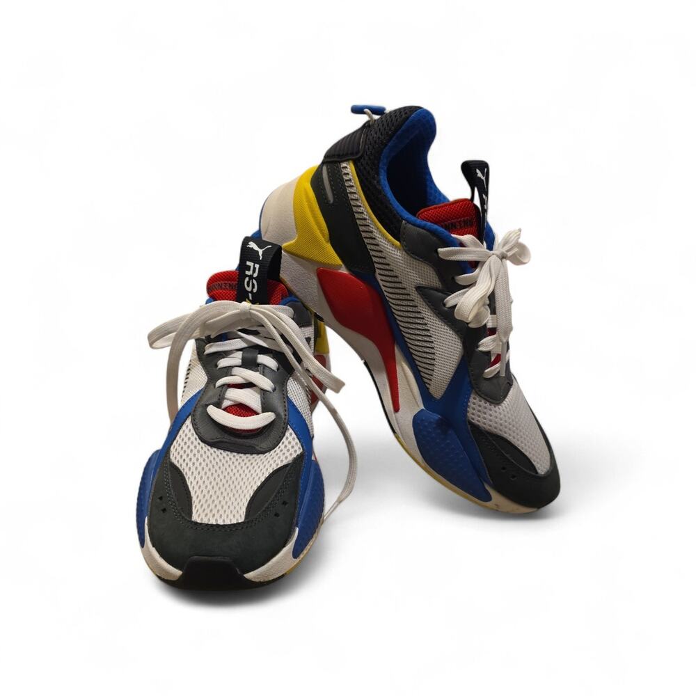 Puma RS-X Toys sneakers with a white, blue, and red colorway Women's 9.5 Men's 8